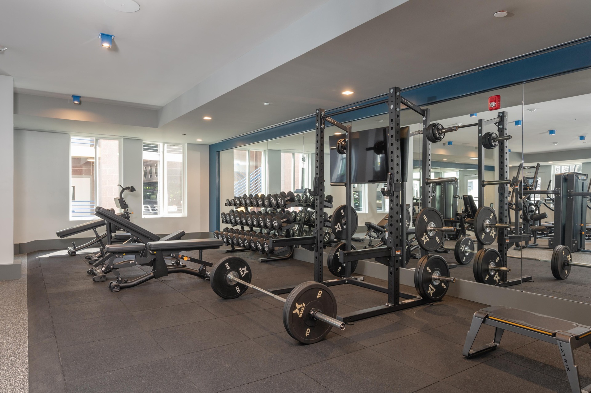 Fitness room with weight equipment.